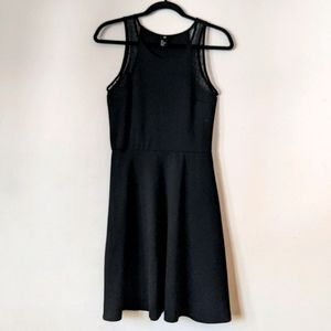 Black sleeveless A-line dress